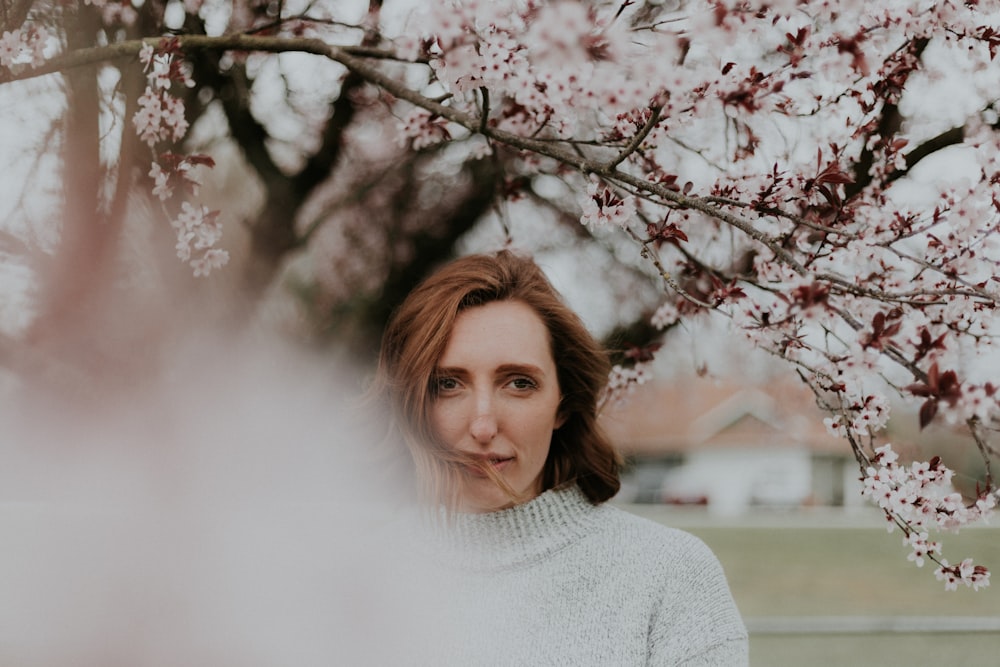 woman under tree