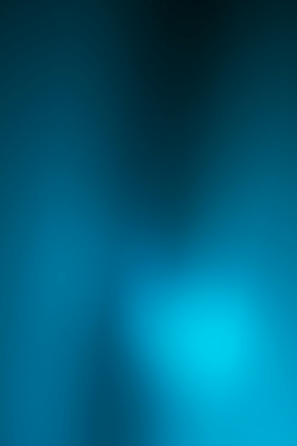 a blurry image of a blue background