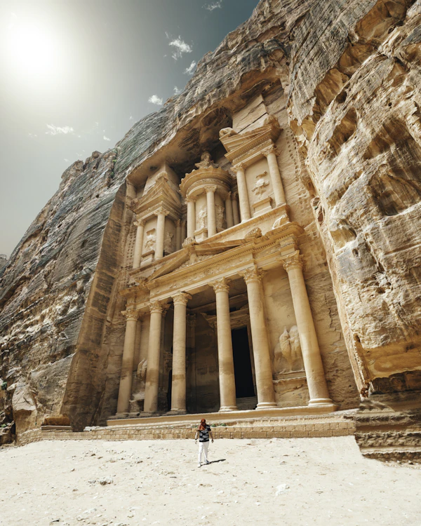 The Treasury (Al-Khazneh) carved into rose-red rock at Petra