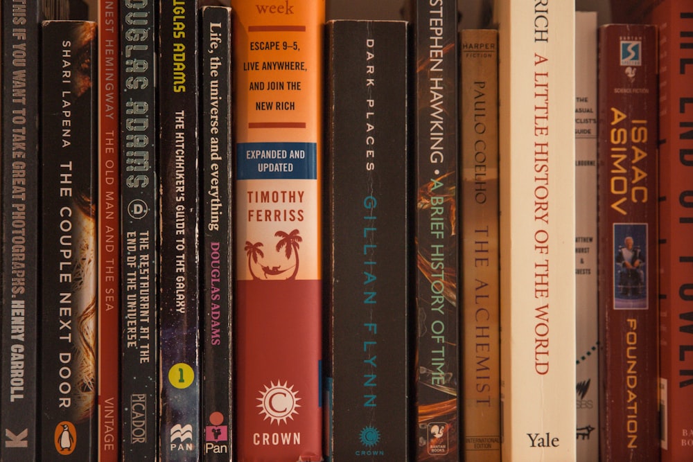 assorted books on a shelf