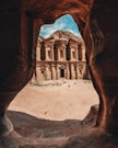 Ancient city carved into sandstone cliffs in Jordan.