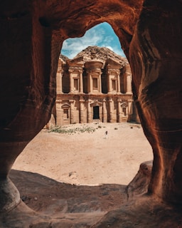 Ancient city carved into sandstone cliffs in Jordan.