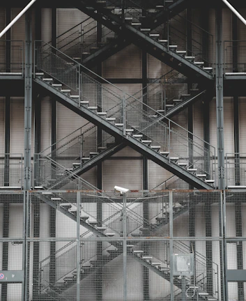 Close-up of galvanized steps attached to a container, highlighting sturdy craftsmanship.