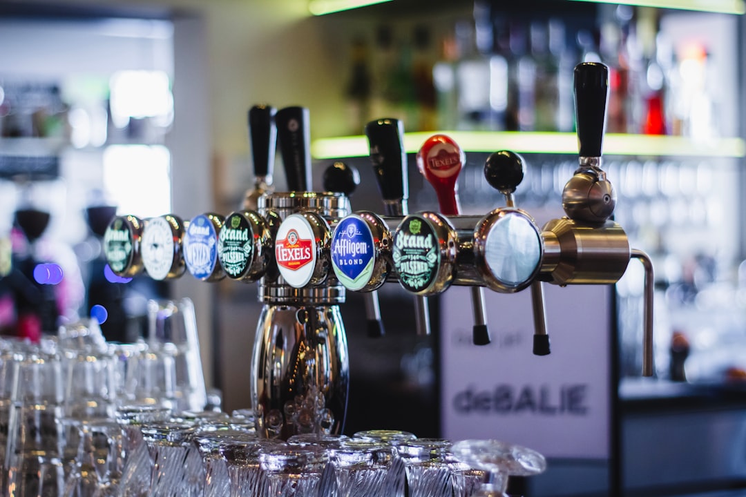 shallow focus photo of liquor dispensers