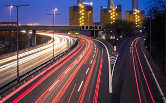 time-lapse photography of vehicle on road