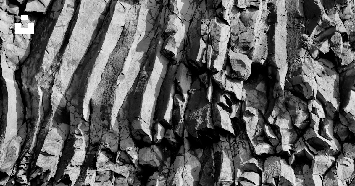 Greyscale Rocks Grayscale photo of rock formation photo – Free Rockface Image on Unsplash