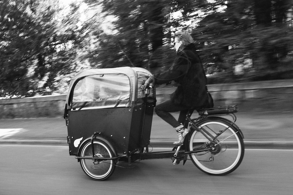 man riding trike