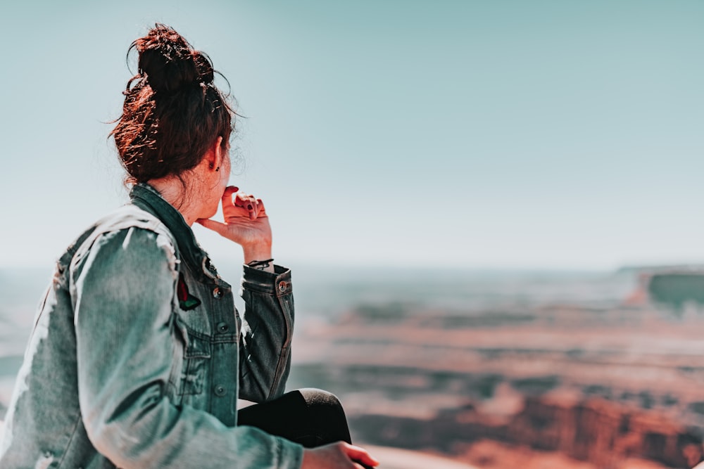 woman in blue denim jacket