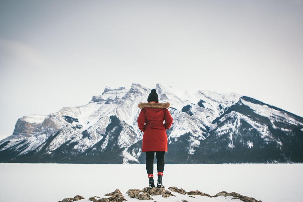 woman standing on rock