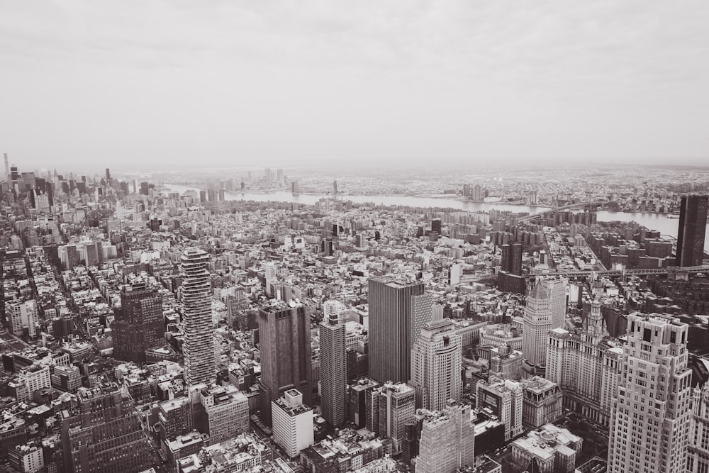 grayscale and aerial photography of buildings during daytime