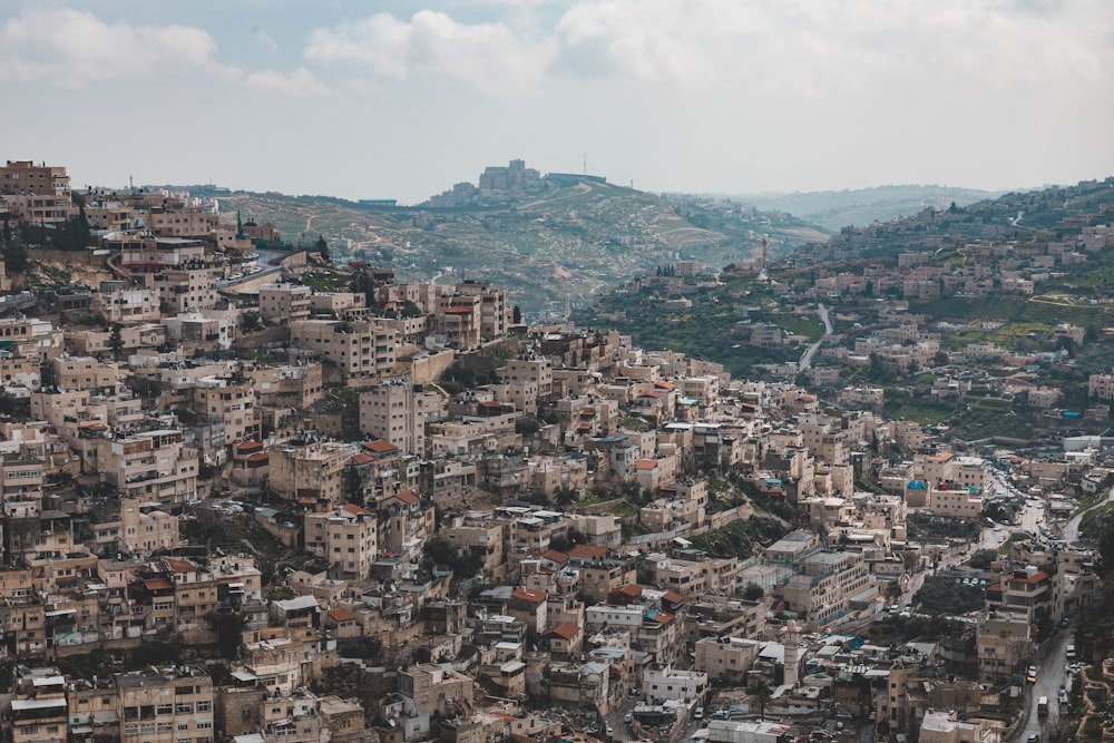 city on mountain during day time