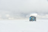 An ice fishing hut with a compact diesel heater keeping the chill away.