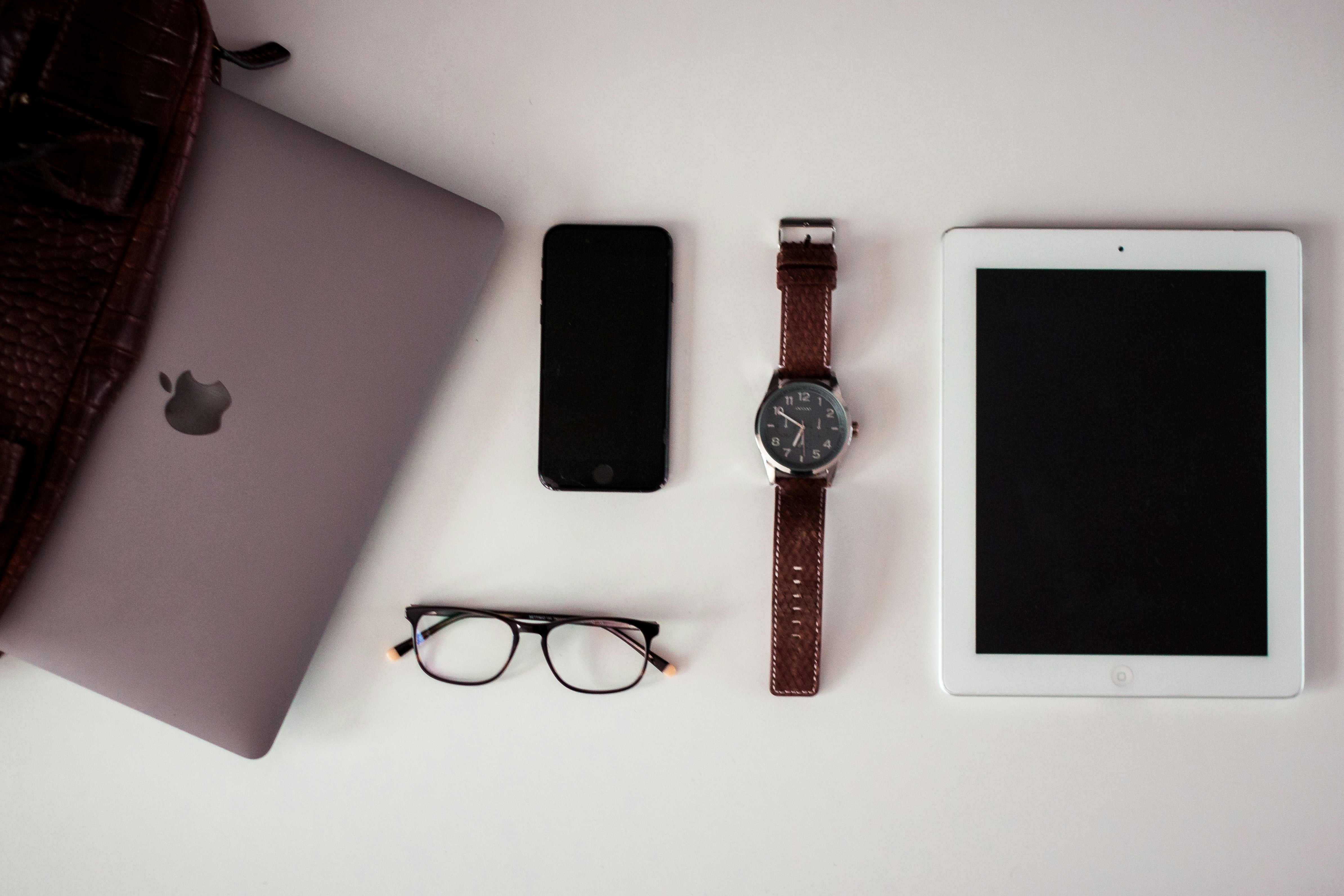 Modern electronics and gadgets arranged on a clean workspace showcasing various tech products for review