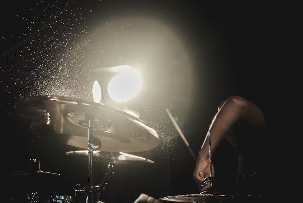 person performing drum