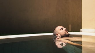 man floating on water