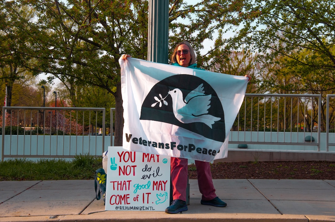 woman showing veterans for peace banner