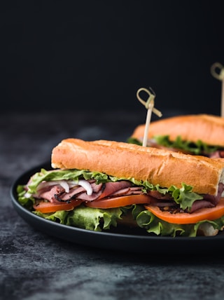 vegetable and meat sandwiches i9n plate