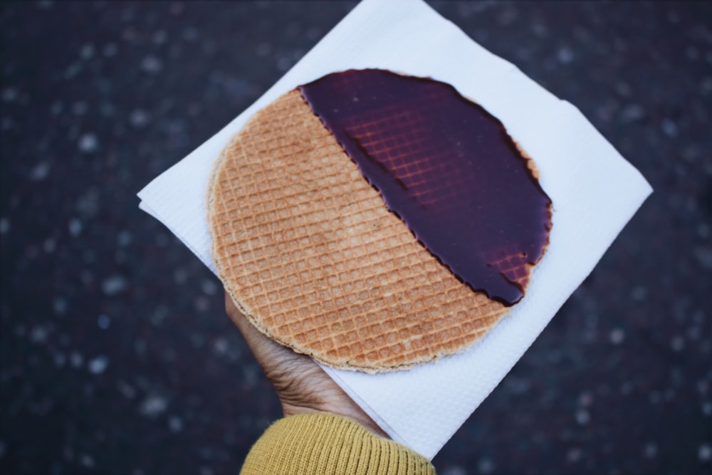 person holding waffle