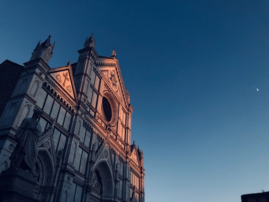 church building during blue hour in Basilica of Santa Croce in Florence Italy