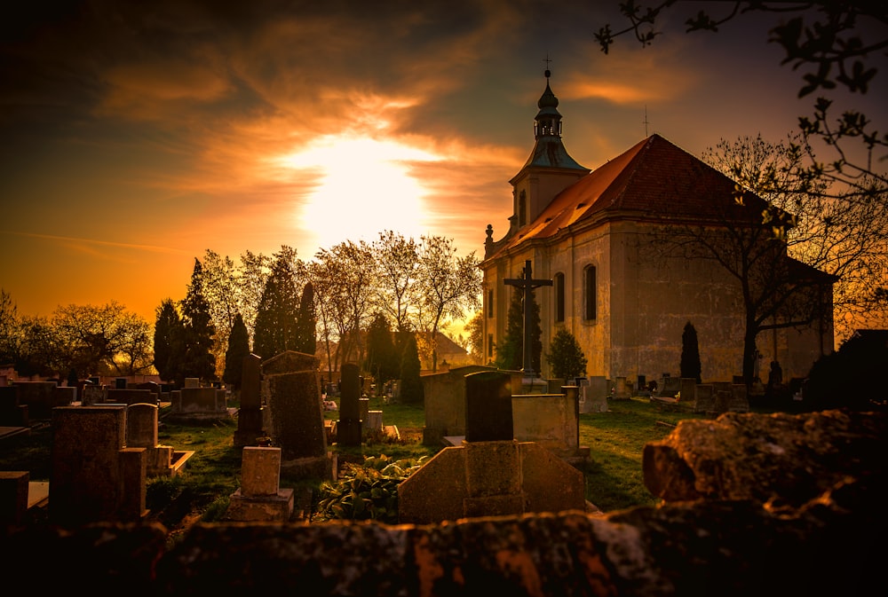 cemetery beside chapel during golden hour