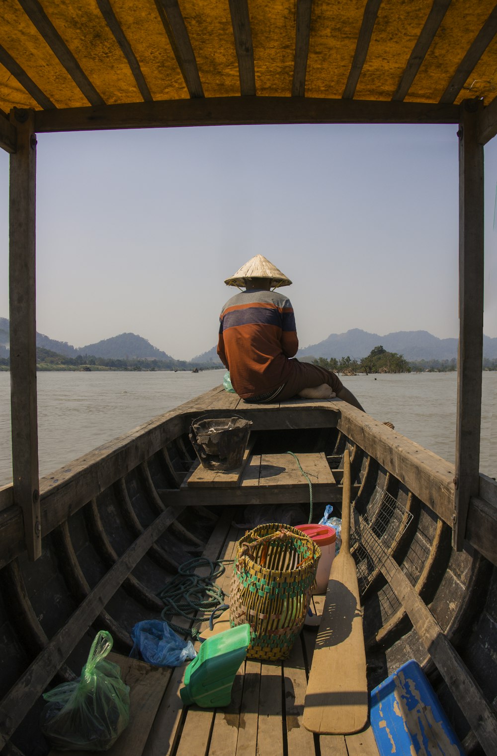 person sitting on boat