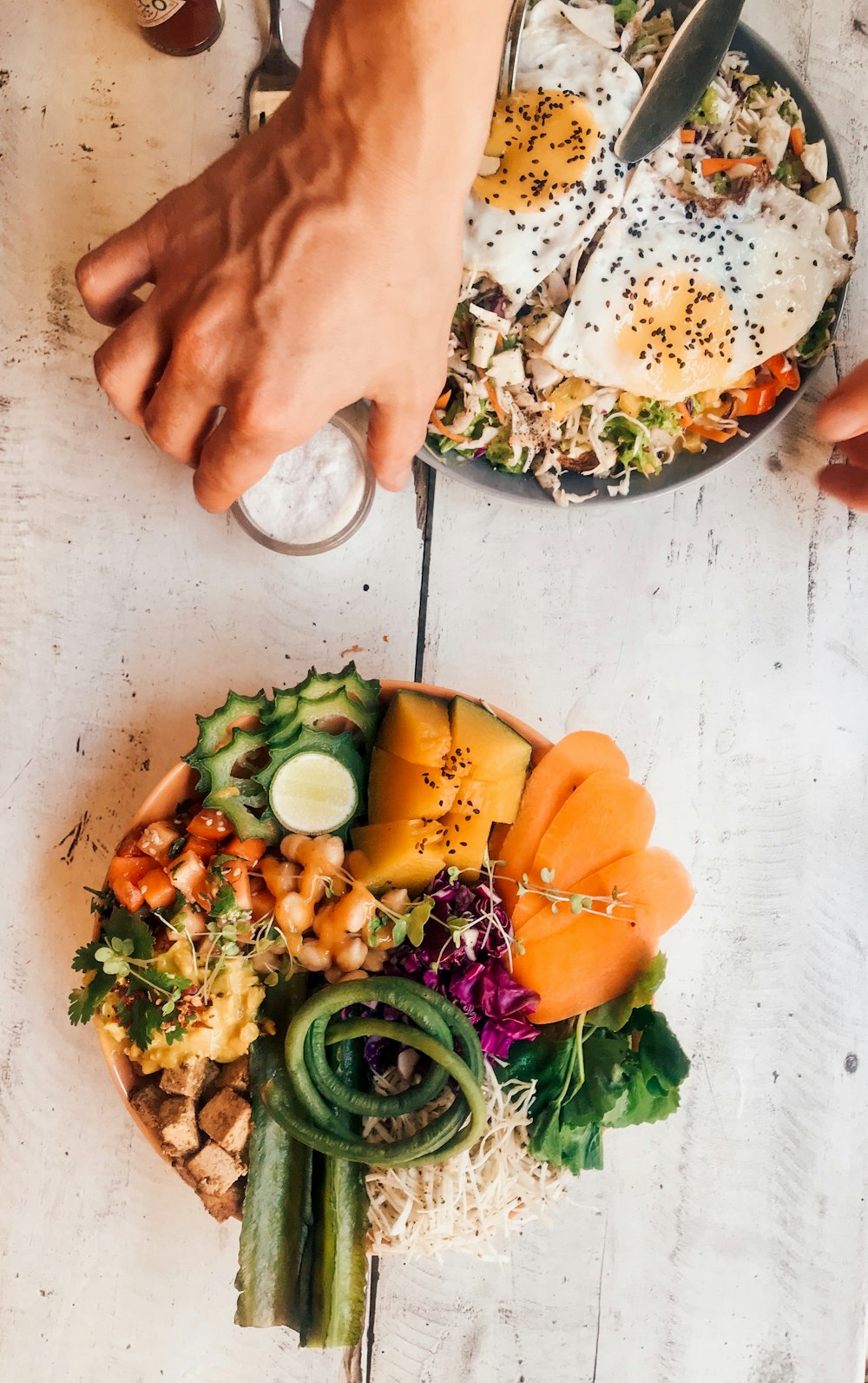 sliced fruits and vegetables in bowl on table