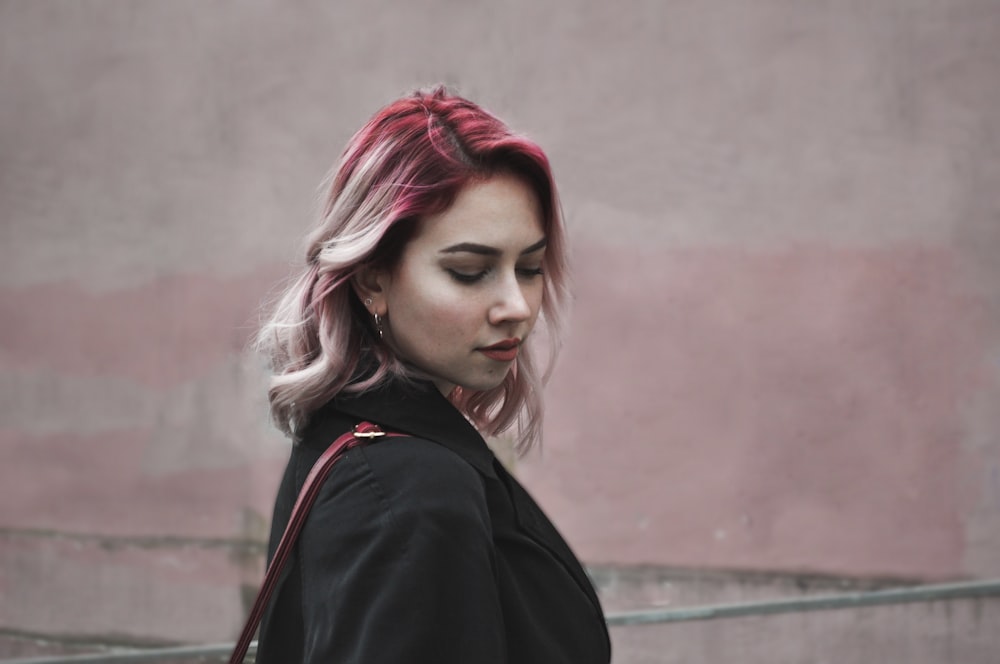 woman in black blazer on focus photography