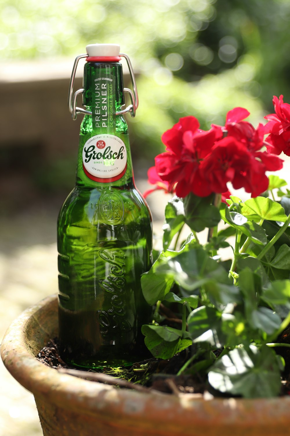 green and red glass bottle