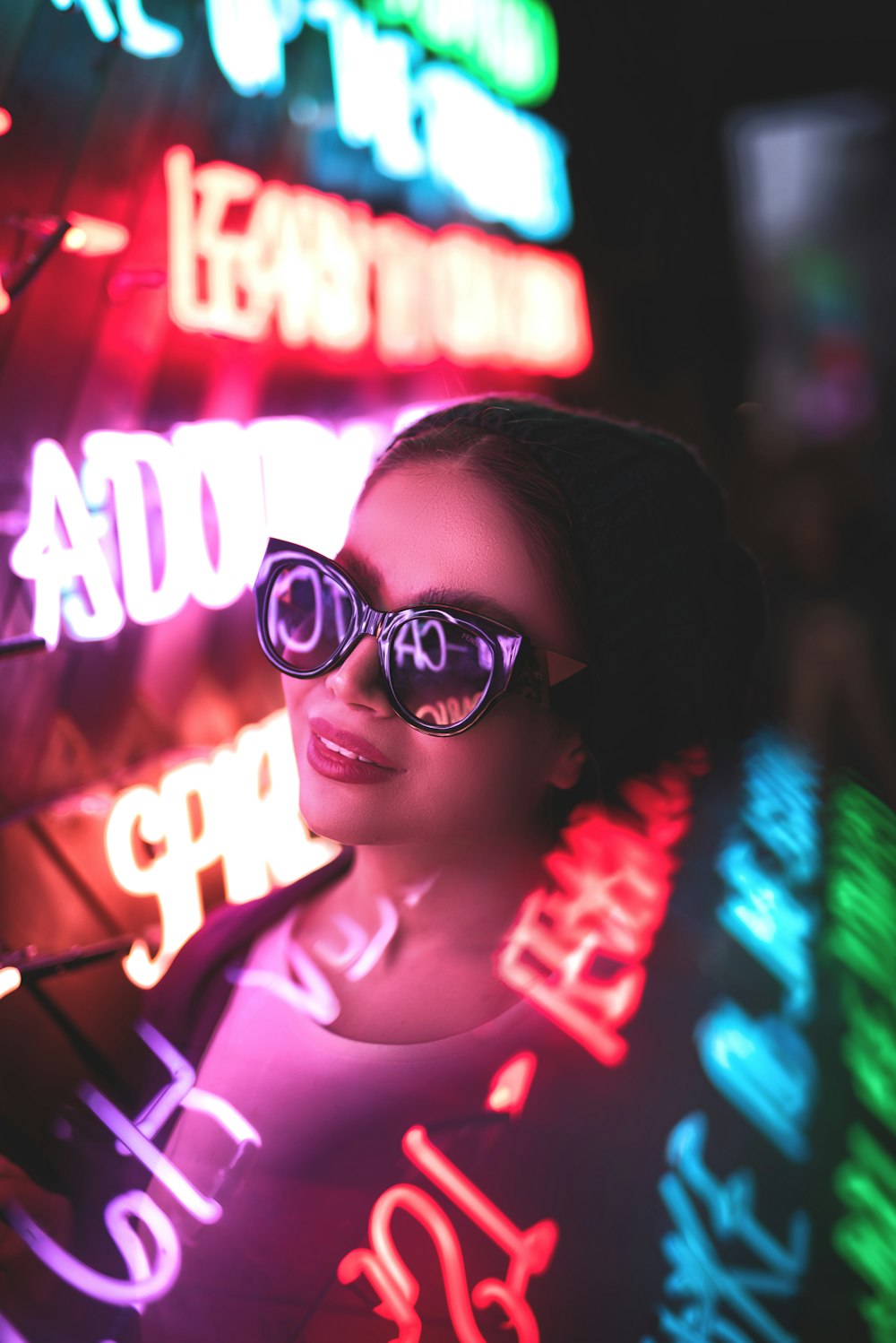 woman surrounded with LED lights