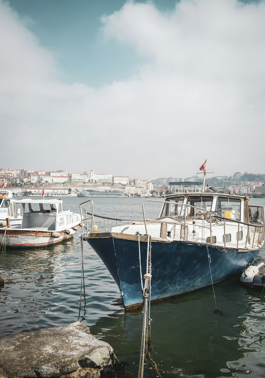 ships on pier during daytime