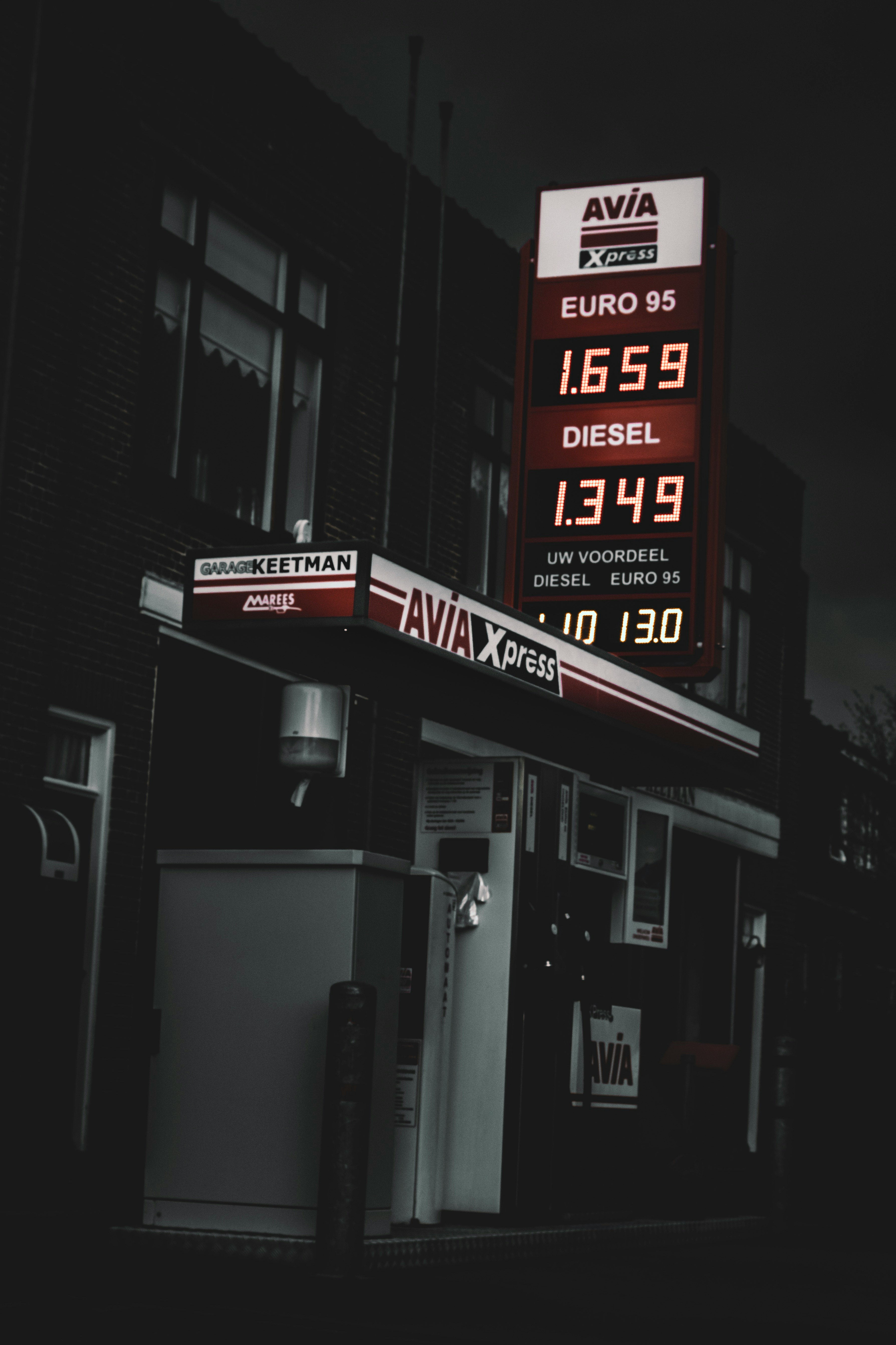 selective color photography of Avia diesel signage