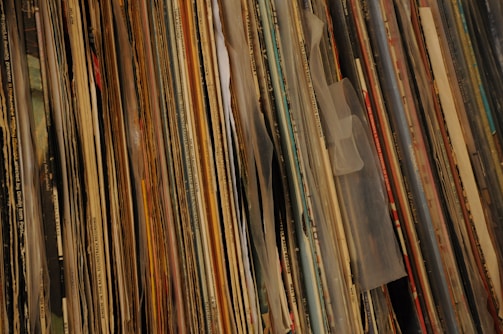 Close-up of stacked vinyl records ready for pressing.