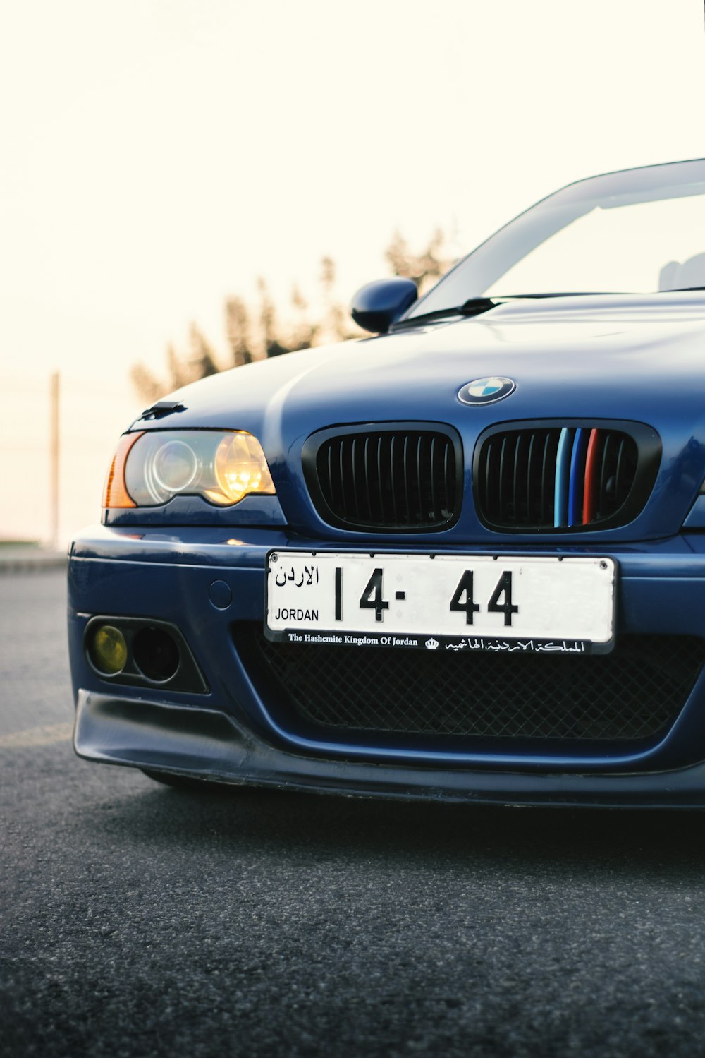 parked black BMW car during daytime