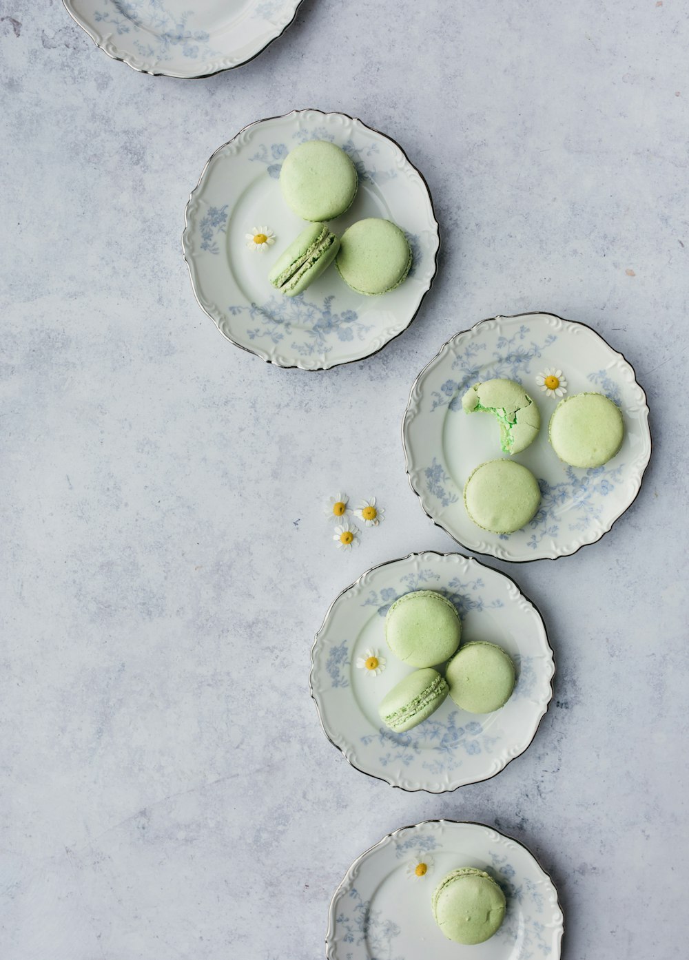 French macaroons on top of round plates