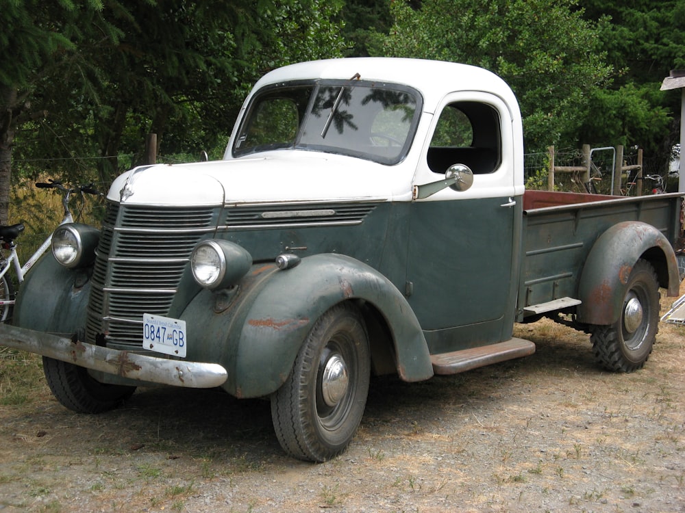 parked white and grey pickup truck