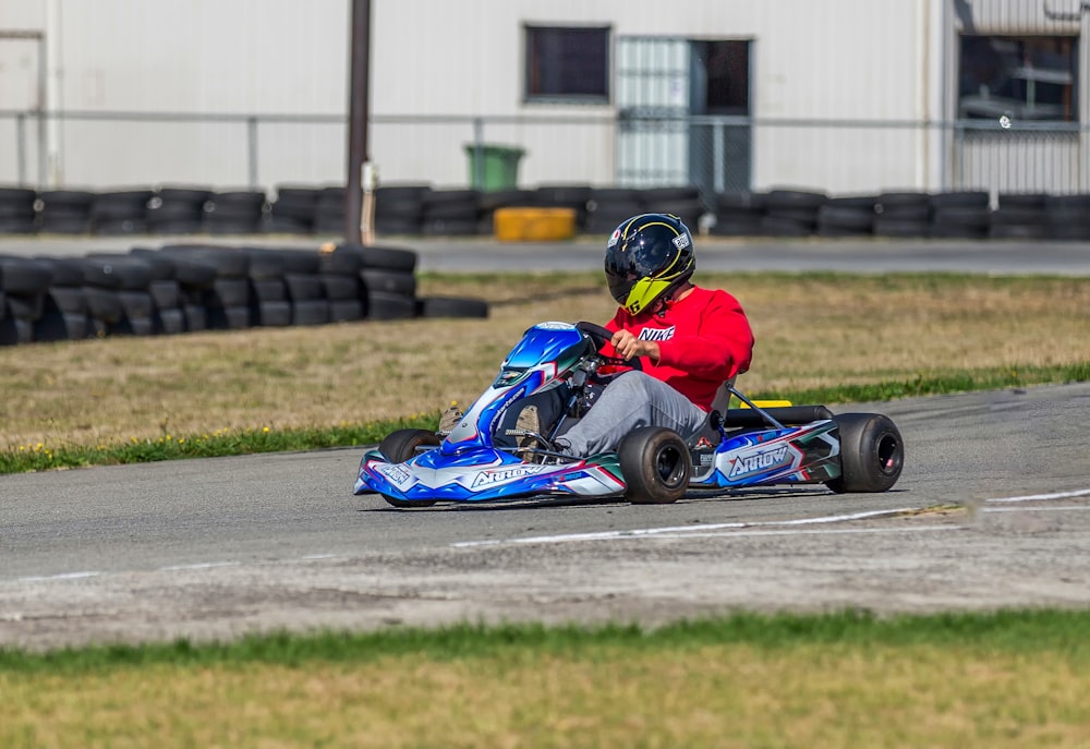 person riding go kart