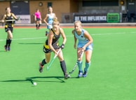 women playing outdoor sports