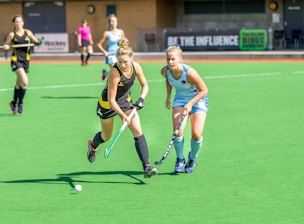 women playing outdoor sports