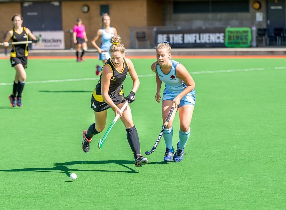 women playing outdoor sports