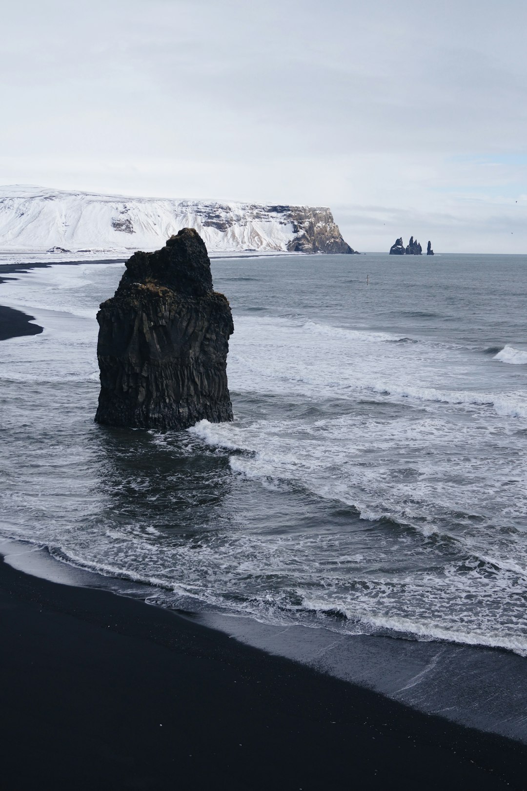 gray rock formation on seashore