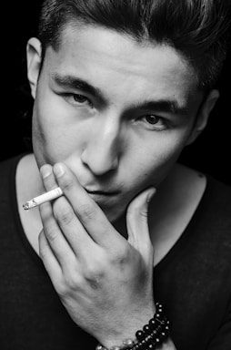 portrait photography,how to photograph a man with a cigarette in his hand