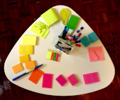 Colorful therapy tools and learning materials arranged neatly on a table.