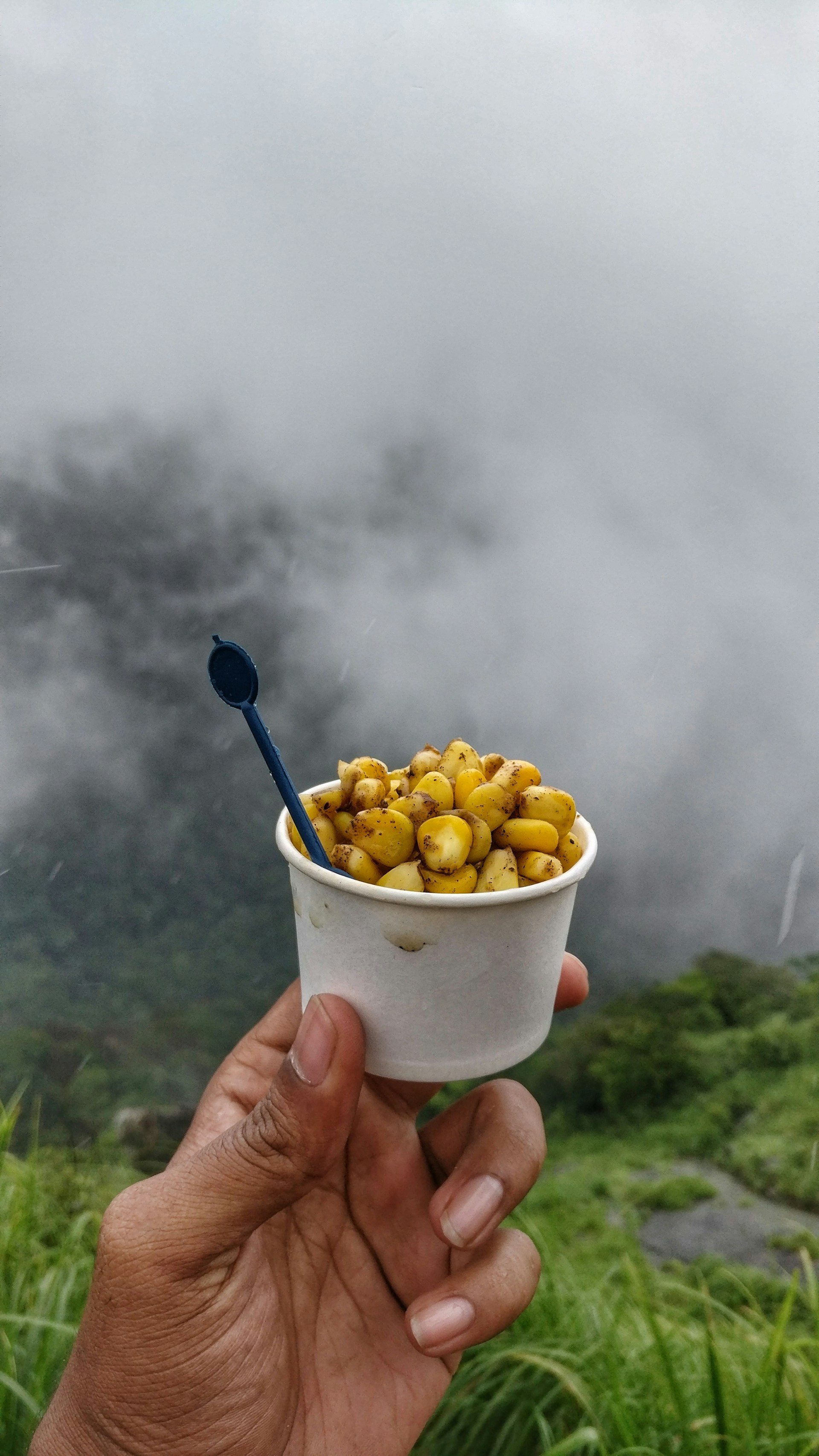 woman wearing yellow long-sleeved dress under white clouds and blue sky during daytime