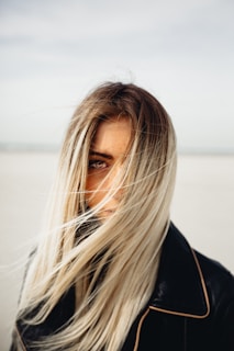 woman in black collared jacket