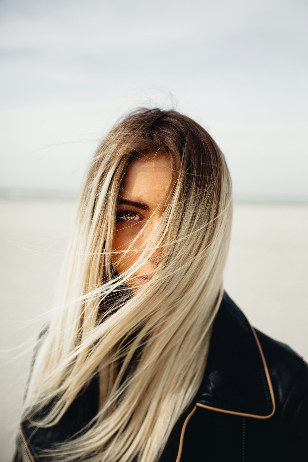 woman in black collared jacket