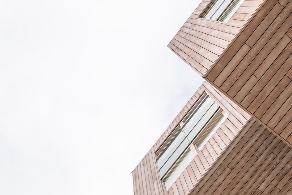 low angle photography of brown building structure