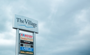 close photo of The Village sign