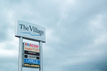 close photo of The Village sign