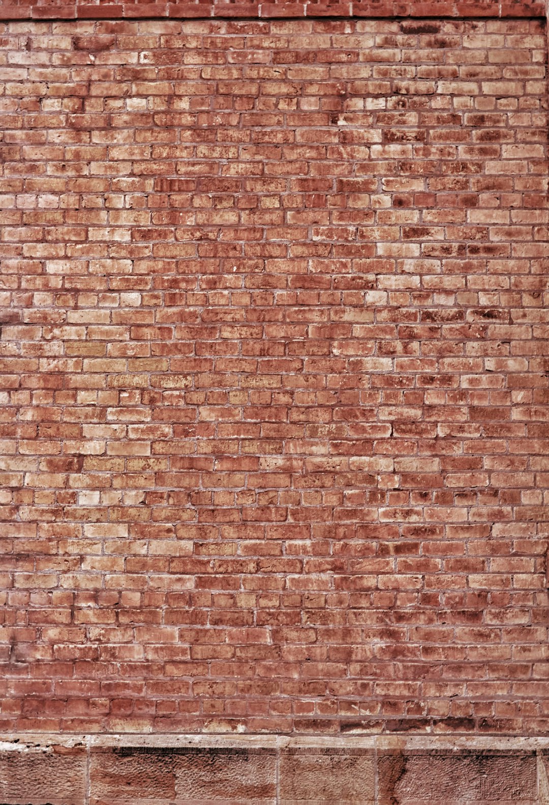 maroon brick wall