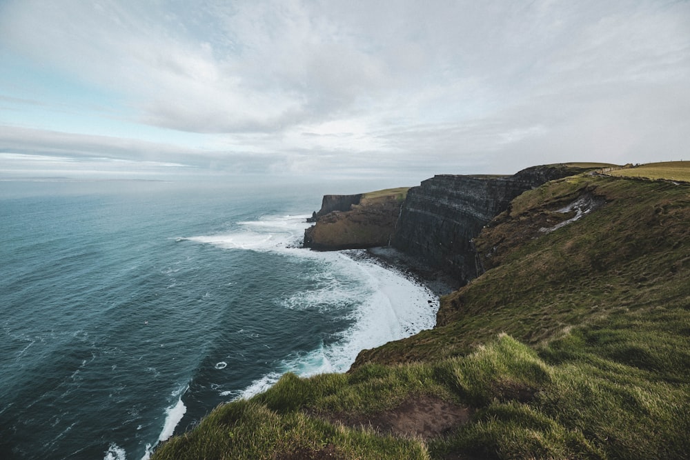 cliff near body of water